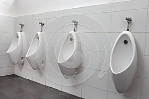 Urinals men in public toilets