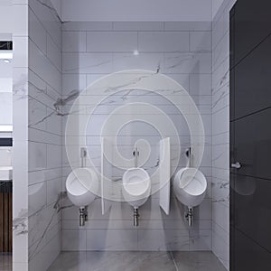 Urinals in a public toilet on a marble wall