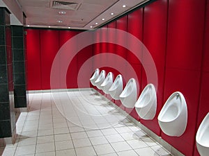 Urinals in a public toilets.