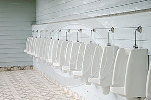 Urinals in toilet.