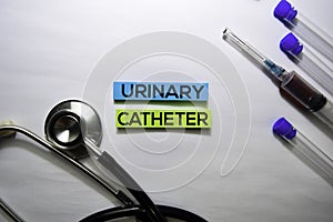 Urinary Catheter text on top view isolated on white background. Healthcare/Medical concept