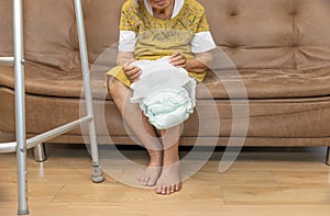 Urinary Incontinence in elderly and changing diaper