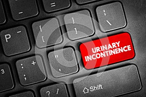 Urinary incontinence - leaking of urine that you can\'t control, text button on keyboard, concept background