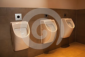An urinoir/urinal in a public toilet