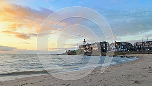 Urk Flevoland Netherlands, harbor with lighthouse on a bright summer in the Netherlands at the historical village of Urk