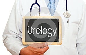 Urology - Doctor holding chalkboard with text photo