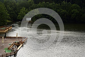 Ursu lake in Sovata, Romania in a rainy day photo