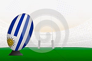 Uruguay national team rugby ball on rugby stadium and goal posts, preparing for a penalty or free kick