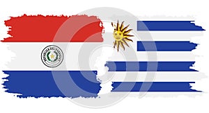 Uruguay and Paraguay grunge flags connection vector