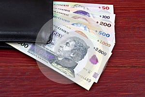 Uruguayan money in the black wallet