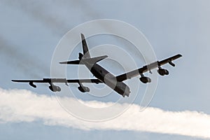 US Air Force Boeing B-52 Stratofortress bomber aircraft performing a low-pass. Sanicole, Belgium - September 13, 2019