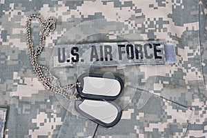 us air force camouflaged uniform with blank dog tags photo