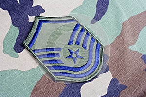 US AIR FORCE Master Sergeant rank patch on woodland camouflage uniform