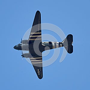 US Airforce plane dropping parachutists