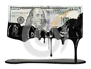 US American dollar bill dripping with oil showing the high cost of gas at the pump or the USA dependency on fossil fuels