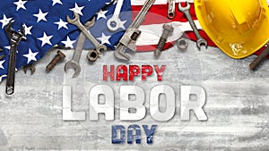 US American flag with work tools on white wooden background. For USA Labor day celebration. With Happy Labor Day text