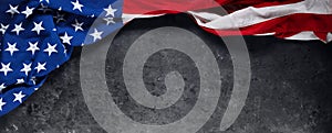US American flag on worn black background. For USA Memorial day, Veteran`s day, Labor day, or 4th of July celebration.