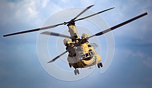 US Army Boeing CH-47F Chinook transport helicopter in flight. The Netherlands - June 22, 2018