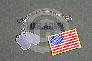 US ARMY Branch Of Service Tape with dog tags and flag patch on olive green uniform