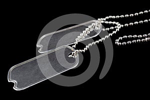 US army dog tags on black