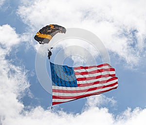 US Army Golen Night Paratrooper with a large American Flag