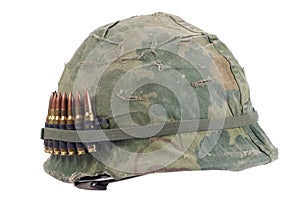 US Army helmet with camouflage cover and ammo belt - Vietnam war period