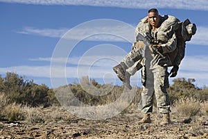 US Army Soldier Carrying Wounded Friend