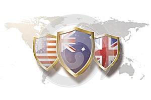 Us Australia and Great Britain flags in golden shield on world map background.aukus defense pact