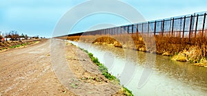US border fence to Mexico at El Paso photo