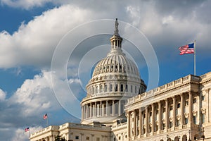 US Capitol Building with American flags is the home of the United States Congress in Washington D.C, USA