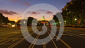 US Capitol building at dawn as seen from Pennsylvania Avenue.