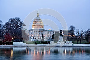 US Capitol Building and reflecting poll at night in Washington, D.C