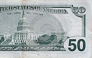 US Capitol on 50 dollars banknote back side closeup macro fragment. United states fifty dollars money bill