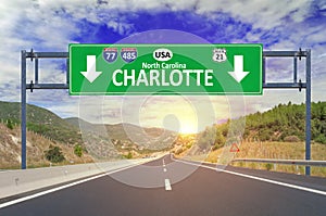 US city Charlotte road sign on highway