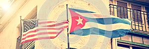 US and Cuban flags side by side in Havana Cuba