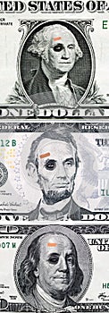US currency with black eyes