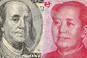 US dollar bill and China yuan banknote macro