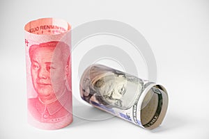 US dollar and Chinese yuan banknotes war