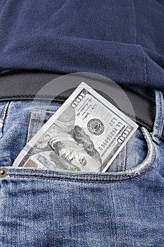 US Dollar notes in the front pocket.