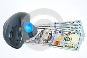 US Dollars banknotes and computer mouse