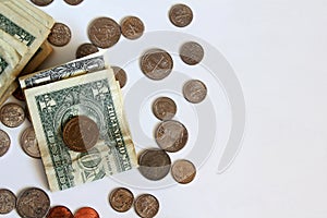 us dollars bill and coin on a white background with copy space,selective focus