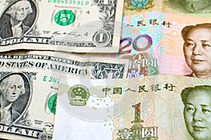 US Dollars and Chinese Yuan banknotes