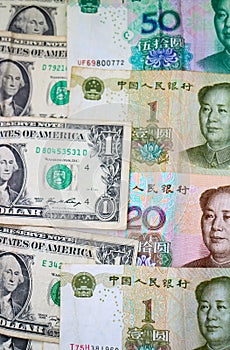 US Dollars and Chinese Yuan banknotes