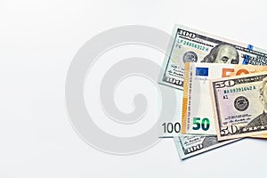 Us dollars and euro bills on white background top view with copy space