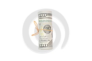 US dollars rolled up and tightened with band isolated on white background