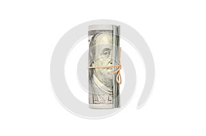 US dollars rolled up and tightened with band isolated on white background