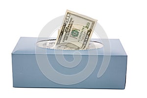 Us dollars in a tissue box