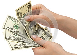 US Dollars in woman's hand, isolated with clipping