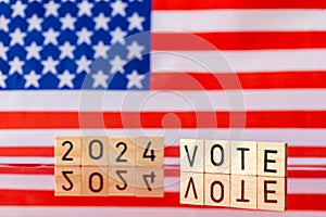 US elections 2024, American flag and the inscription VOTE 2024. The concept of voting in the United States in 2024