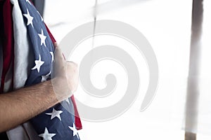 US flag and a man